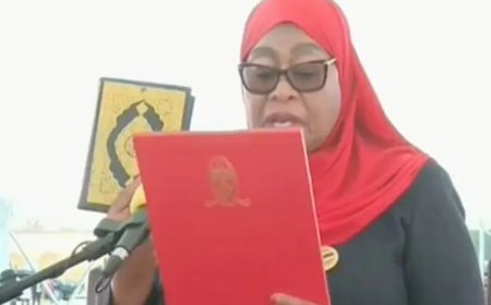 President Suluhu receives 21-gun salute during swearing-in ceremony