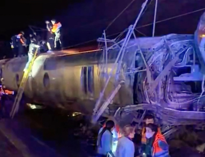 At least 21 dead and dozens injured in collision between two trains in Spain
