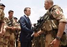 Macron says officer killed in Iraq as pro-Iran group vows to target French interests