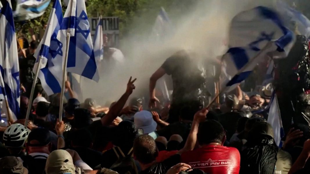 Confrontations with police escalate as a crucial law on Israel's judicial reform gets passed