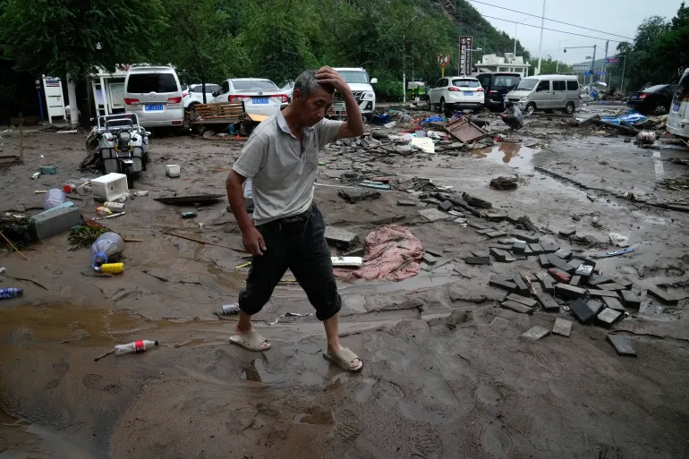 Deadly rains batter northern China in aftermath of storm Doksuri